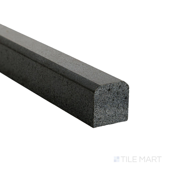 Corner detail of Basalt Black 0.75x12 honed modern liner highlighting refined edge and smooth honed surface.