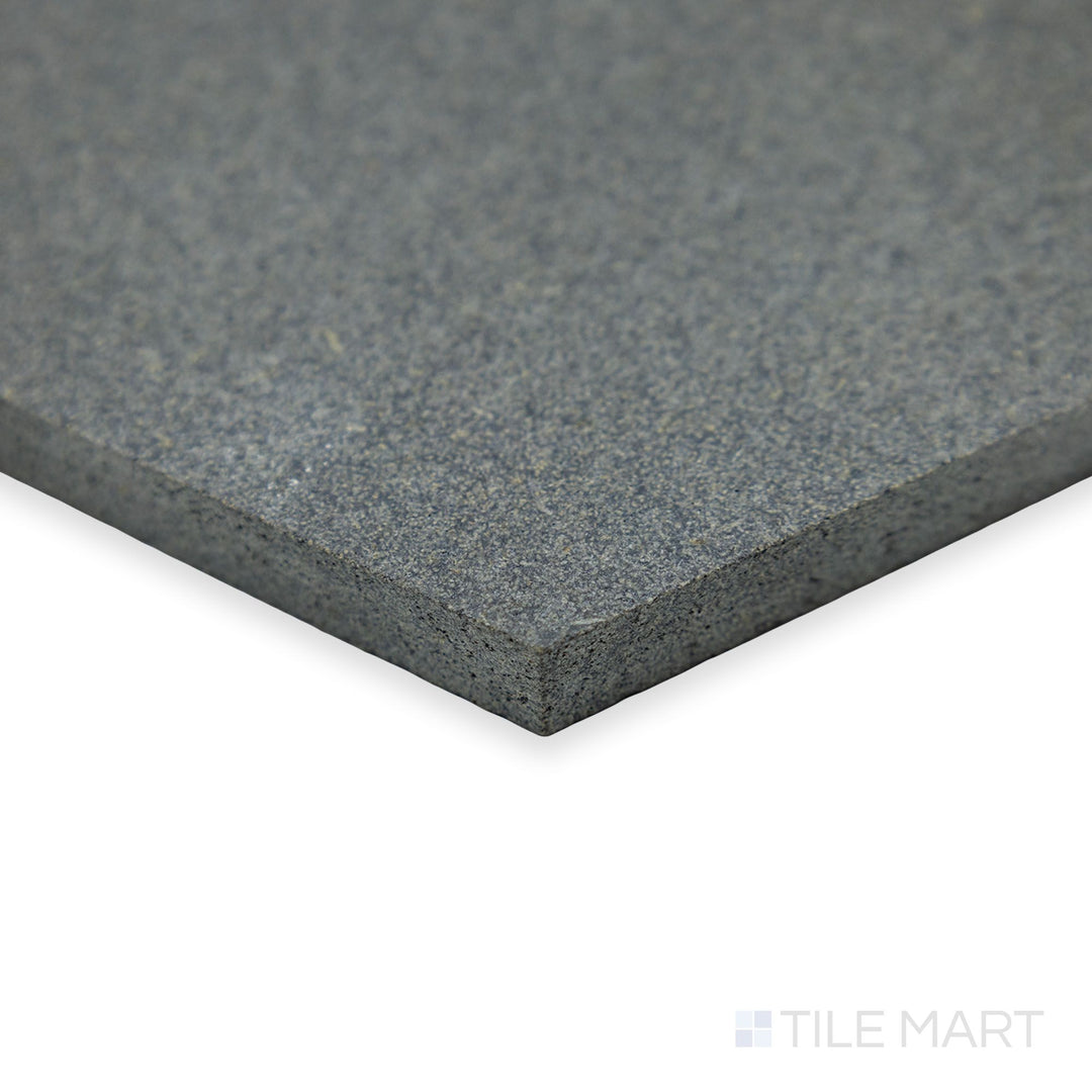 A stylish corner shot of Basalt Grey 10" hexagon honed tile highlights its geometric appeal and soft honed texture, blending elegance with natural stone beauty.