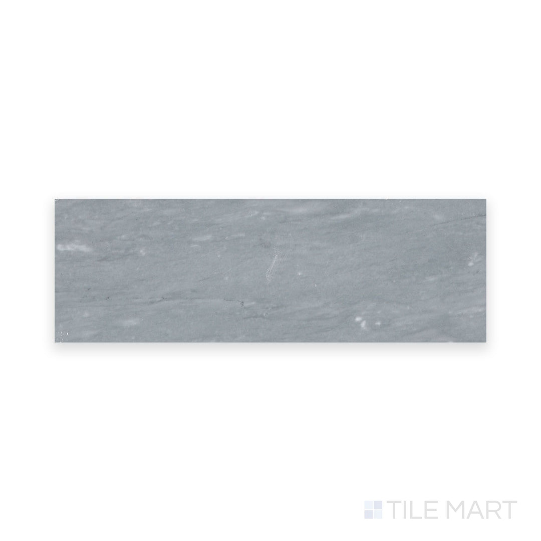 A close-up of Bardiglio Imperiale Bluish Grey 4X12 Honed Marble, showcasing its smooth, matte surface with soft grey veining.