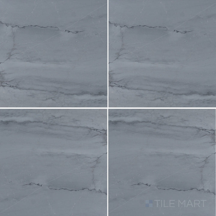 Flat-lay shot of Bardiglio Imperiale Bluish Grey 12x12 honed marble tile, displaying a classic honed finish with soft blue-grey veining.