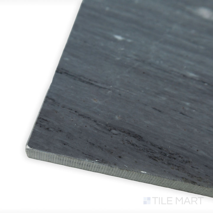 A classic yet contemporary look is displayed in this corner shot of Bardiglio Imperiale Bluish Grey 18x18 honed marble tile, featuring a soft, muted surface and intricate natural veining.