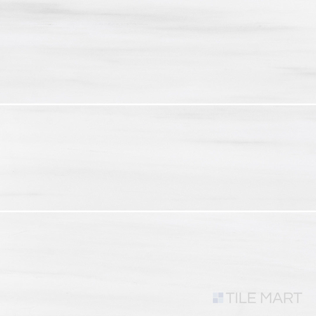 Honed Bianco Dolomite marble 4x12 tile featuring soft natural veining in a clean overview image