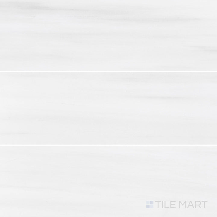 Honed Bianco Dolomite marble 4x12 tile featuring soft natural veining in a clean overview image