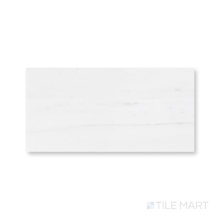 Top-down view of honed Bianco Dolomite marble 6x12 tile with subtle natural movement