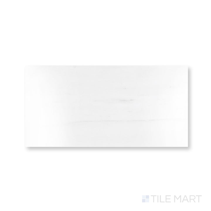 Full-piece view of polished Bianco Dolomite marble 6x12 tile with luminous stone character