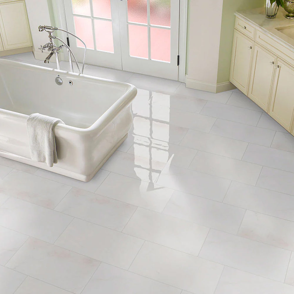 Polished Bianco Dolomite marble 12x24 tile highlighted in a bright space with luminous finish