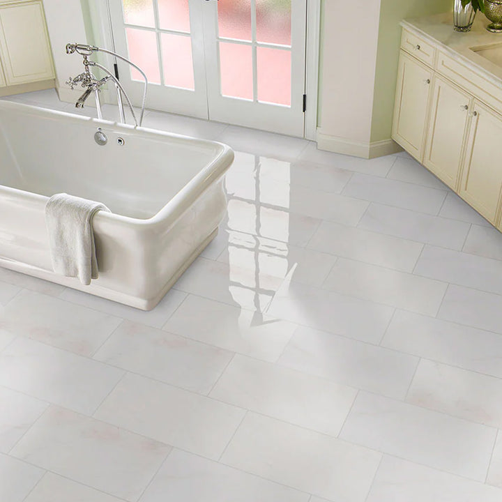 Polished Bianco Dolomite marble 12x24 tile highlighted in a bright space with luminous finish