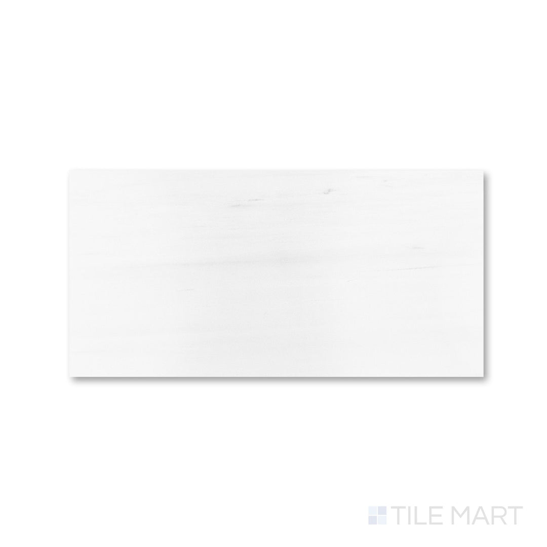 Polished Bianco Dolomite marble 12x24 tile in close detail with smooth finish and refined veining