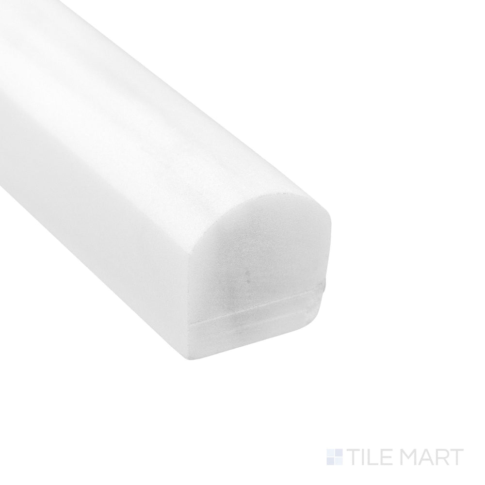 Corner close-up of Bianco Dolomite Marble 0.75x12 honed standard liner showing smooth matte surface and soft edge.