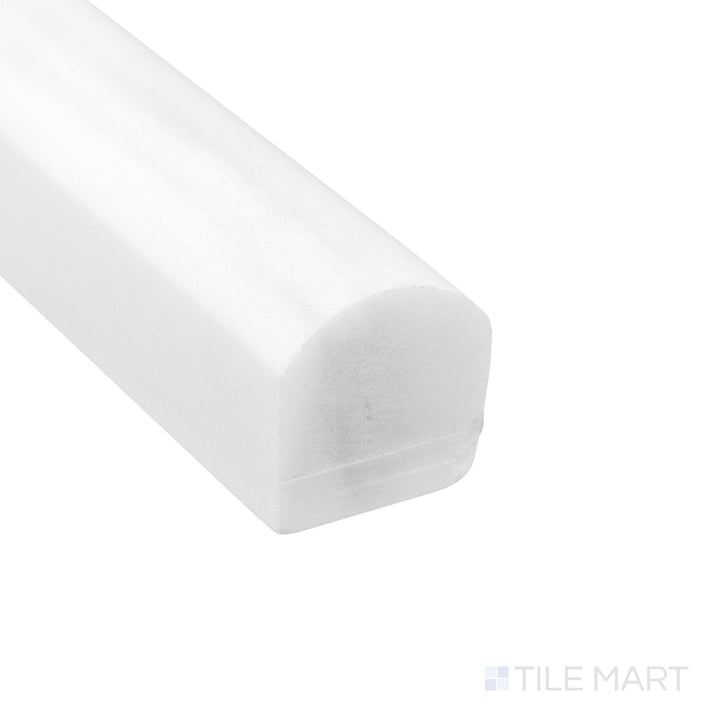 Corner close-up of Bianco Dolomite Marble 0.75x12 honed standard liner showing smooth matte surface and soft edge.