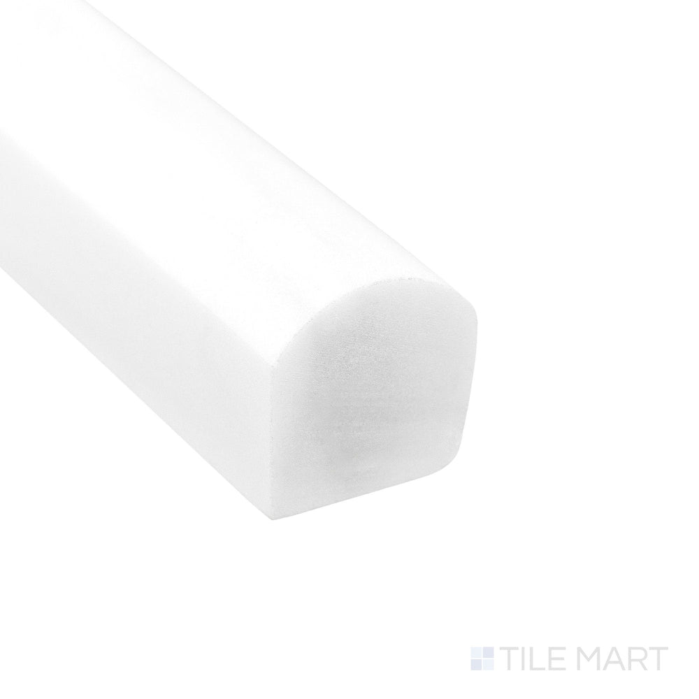 Corner detail of Bianco Dolomite Marble 0.75x12 polished standard liner highlighting glossy surface and bright tone.