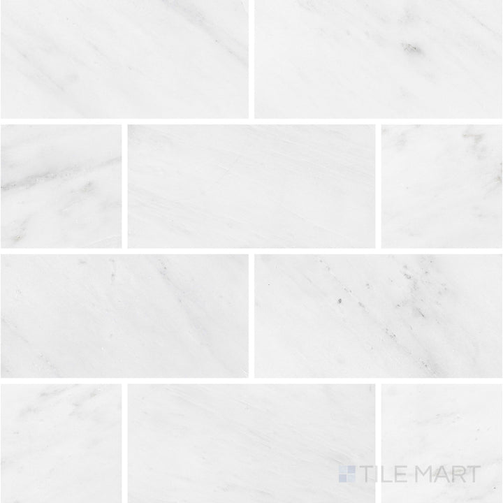 Top-down view of Oriental White Marble 3x6 honed tile, featuring a soft matte finish that highlights the natural white and grey veining.