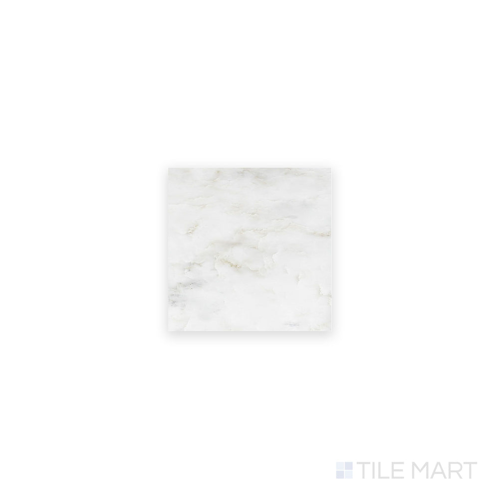 A crisp close-up of Oriental White Marble 4X4 Honed, highlighting its smooth honed finish with delicate veining.