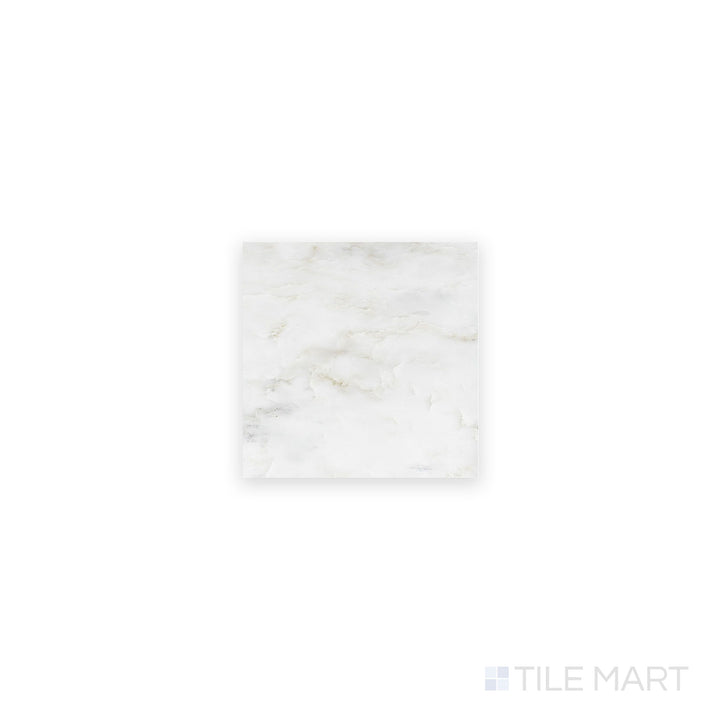 A crisp close-up of Oriental White Marble 4X4 Honed, highlighting its smooth honed finish with delicate veining.