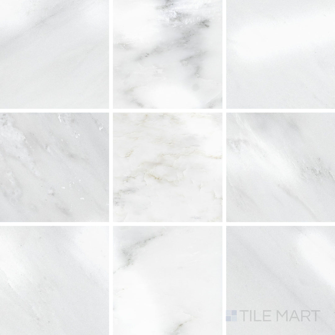 Top-view photo of Oriental White Marble 4x4 polished tile, featuring a reflective surface that highlights the natural beauty of the veining.
