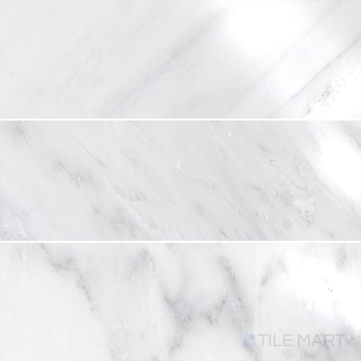 Flat-lay shot of Oriental White Marble 4x12 polished tile, showcasing a high-gloss finish that enhances the white and grey veining.