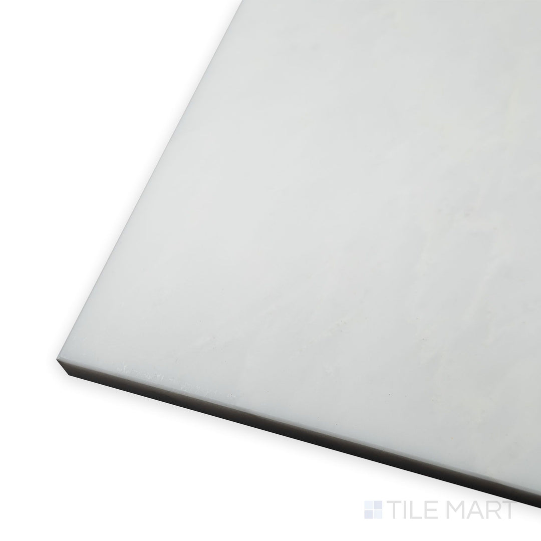 A polished and reflective finish takes center stage in this corner view of Oriental White Marble 4x12 polished tile, enhancing its bright and airy appeal.