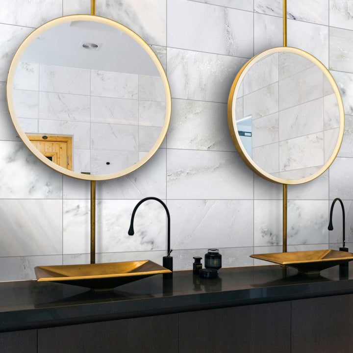 A grand and sophisticated space integrating Oriental White Marble 6X12 Honed, creating a seamless and elegant flow with its natural variations and soft white tones.