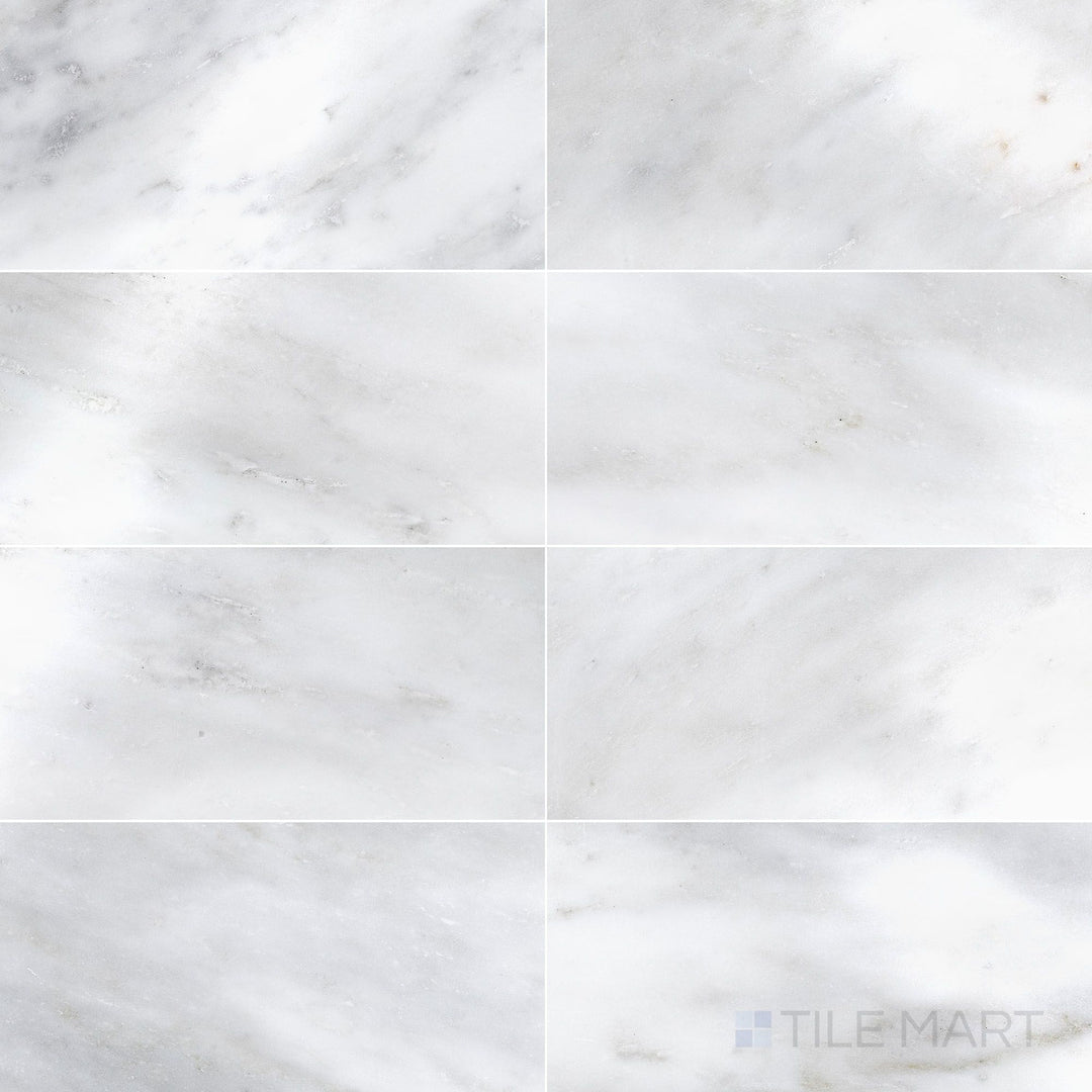 Overhead image of Oriental White Marble 12x24 polished tile, offering a smooth, reflective surface with elegant natural veining.