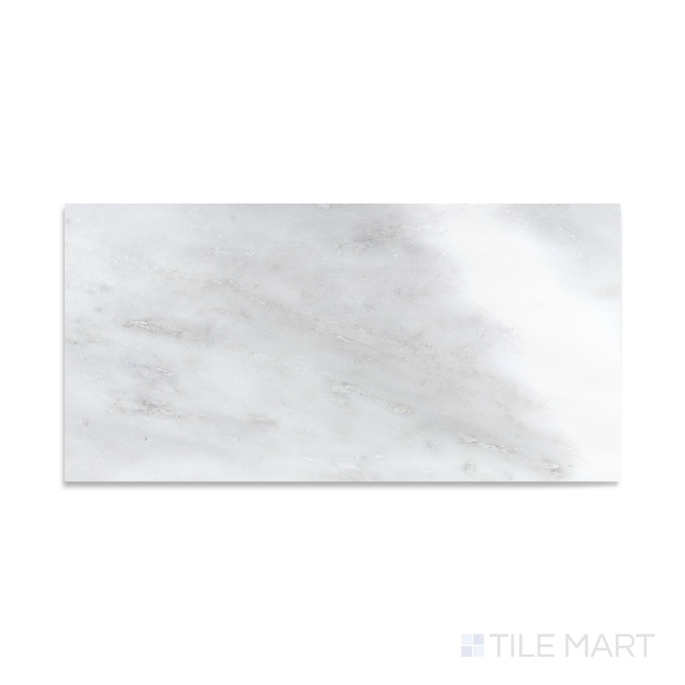 A close-up angle of Oriental White Marble 12X24 Polished, reflecting natural stone elegance with a high-shine finish.