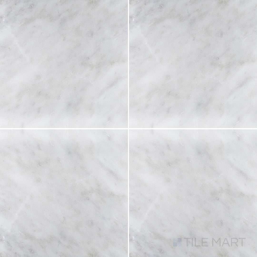 Flat-lay shot of Oriental White Marble 18x18 honed tile, displaying a balanced square format with a soft honed surface.