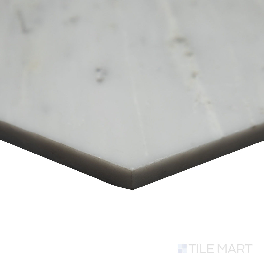 The geometric precision of Oriental White Marble 6" hexagon honed tile is accentuated in this corner shot, highlighting its structured layout and soft, honed surface.