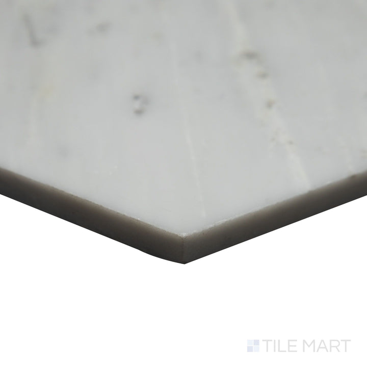 The geometric precision of Oriental White Marble 6" hexagon honed tile is accentuated in this corner shot, highlighting its structured layout and soft, honed surface.