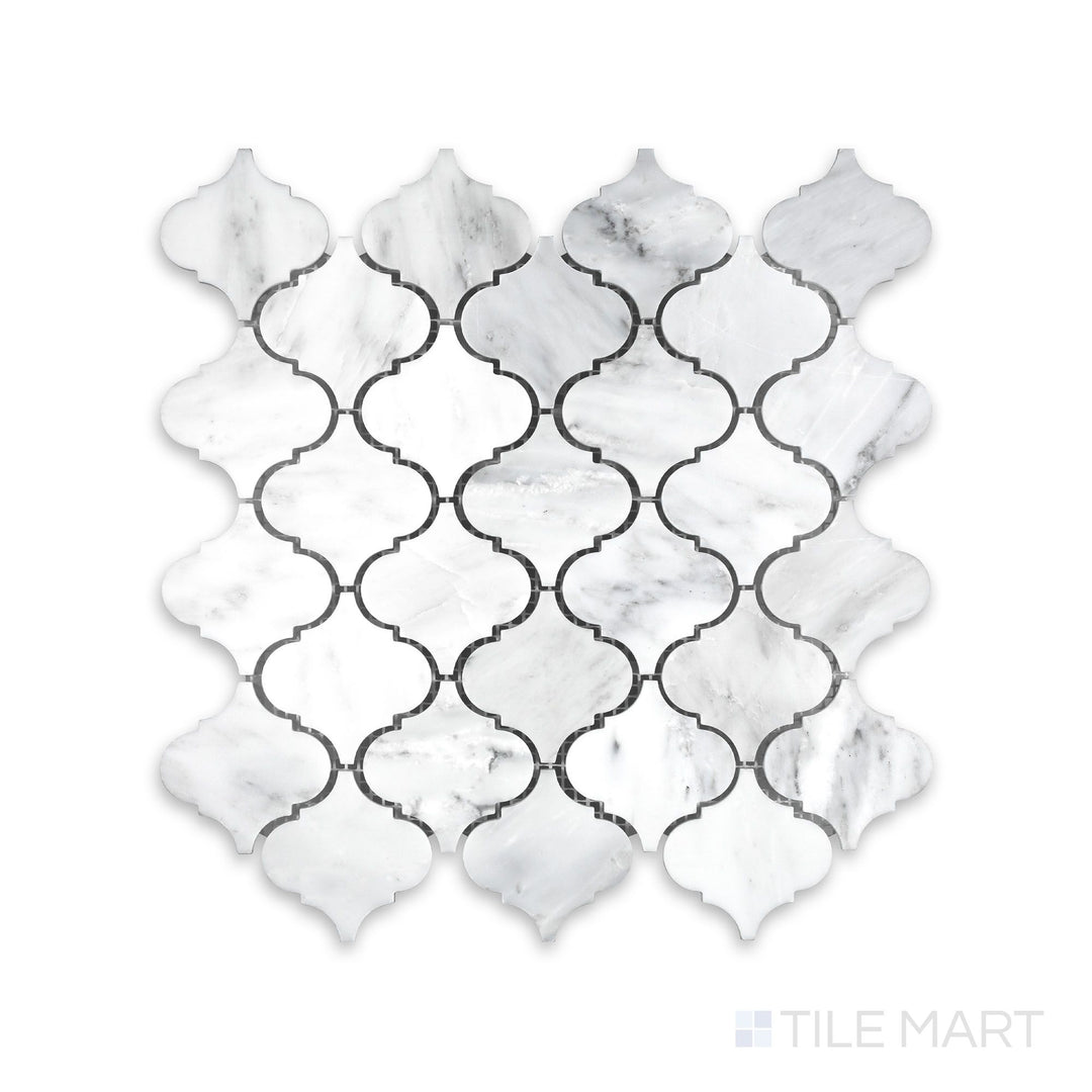 An up-close view of Oriental White Marble 3" Lantern/Arabesque Honed Mosaic, emphasizing the curved edges and smooth honed texture.