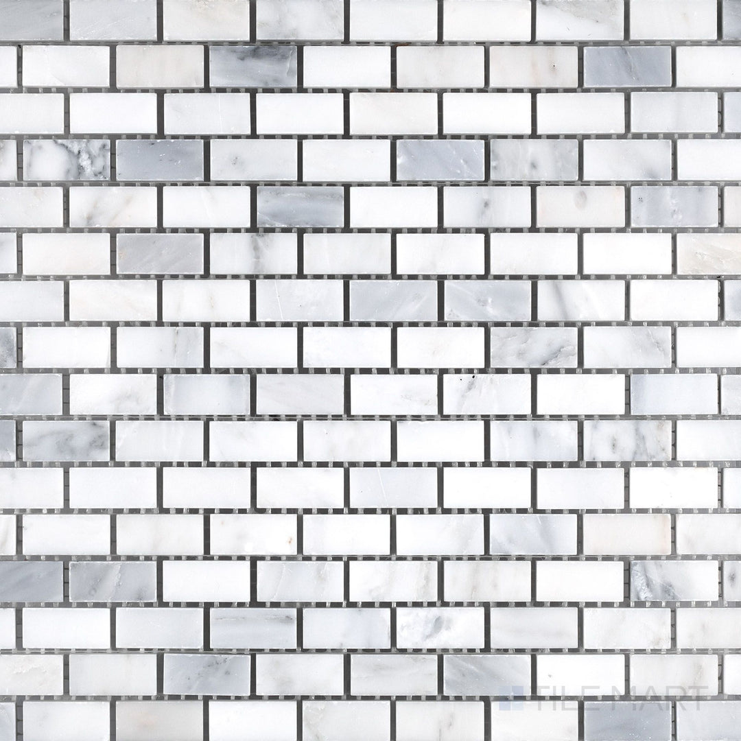 Flat-lay shot of Oriental White Marble 5/8x1-1/4 brick honed mosaic, showcasing a classic brick layout with a soft matte finish.