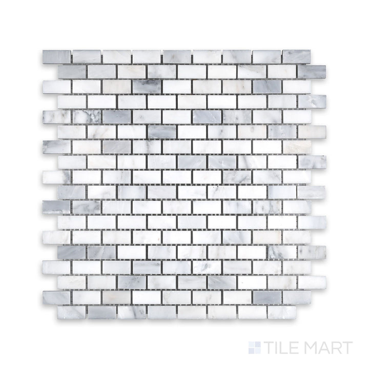 A close-up angle of Oriental White Marble 5/8X1-1/4 Brick Honed Mosaic, showcasing its structured brick layout with a matte finish.