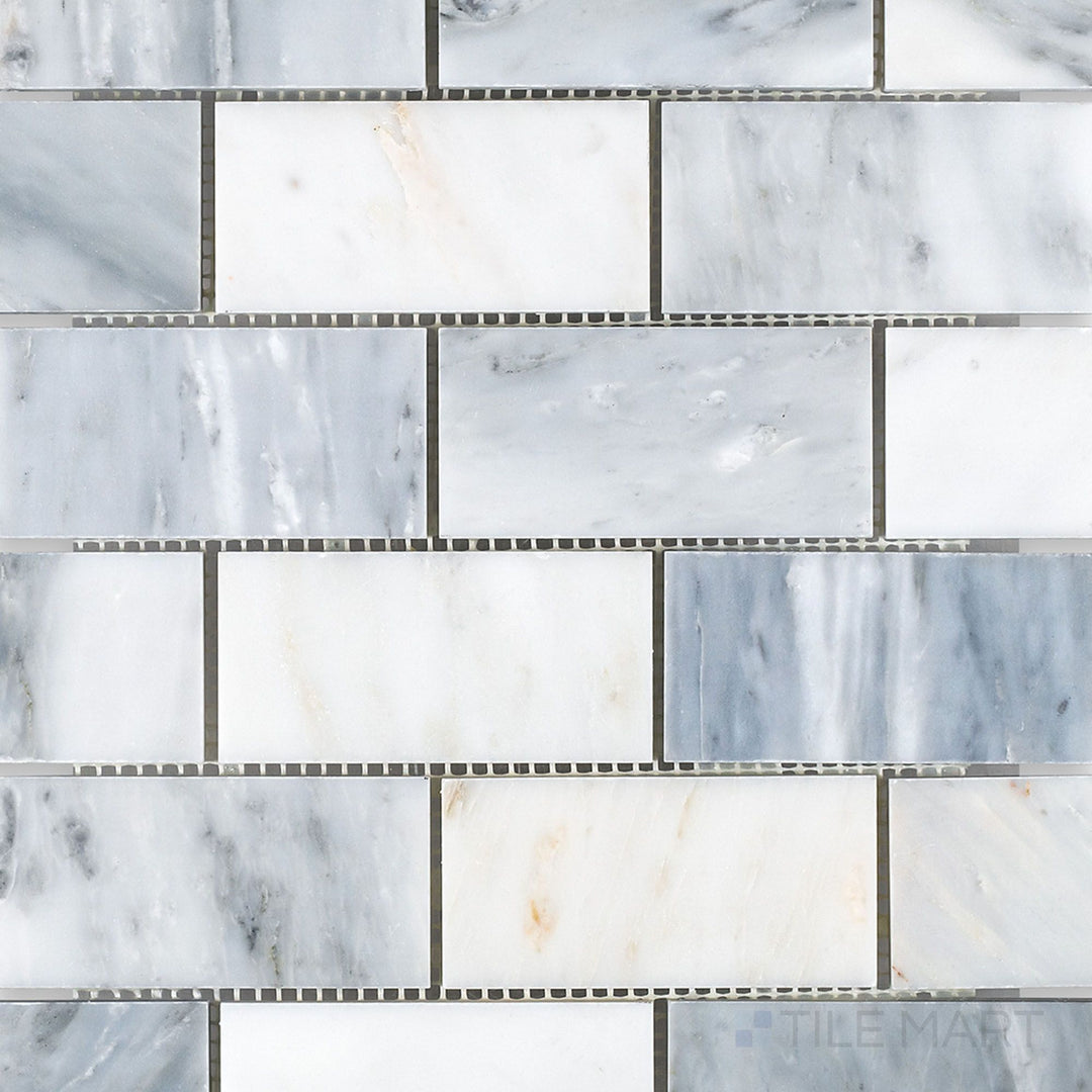 Top-view photo of Oriental White Marble 2x4 brick honed mosaic, displaying a larger brick layout with a soft matte finish.