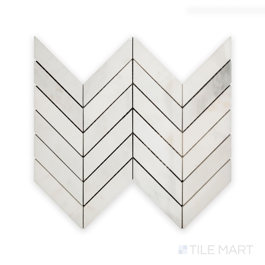 Intricate close-up of Oriental White Marble 1X4 Chevron Polished Mosaic, featuring a sleek, polished finish that enhances its elegant pattern.