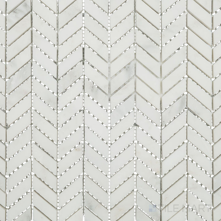Overhead image of Oriental White Marble mini chevron honed mosaic, displaying a compact chevron design with a soft honed texture.