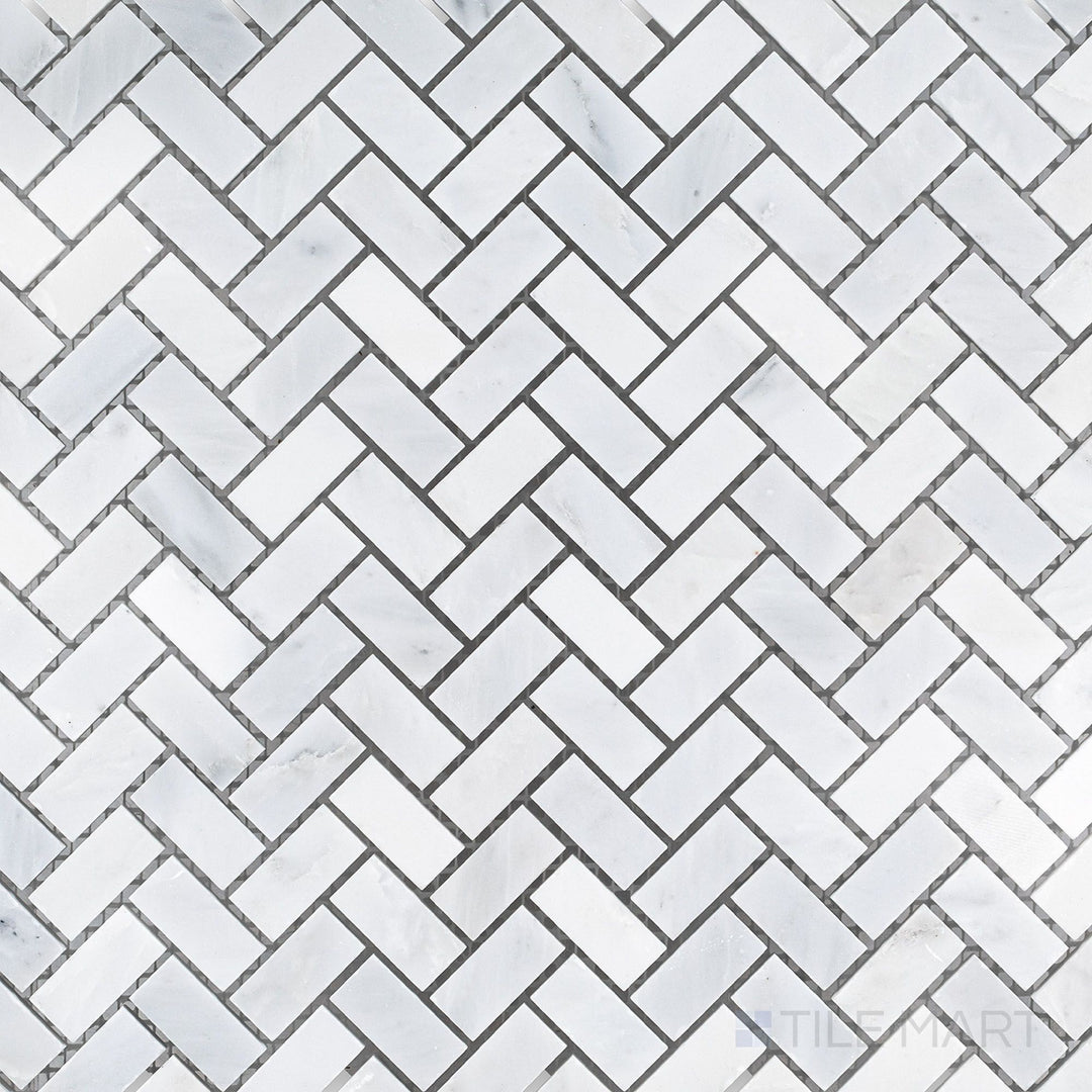 Top-view photo of Oriental White Marble 5/8x1-1/4 herringbone honed mosaic, showcasing a classic herringbone layout with a smooth honed texture.