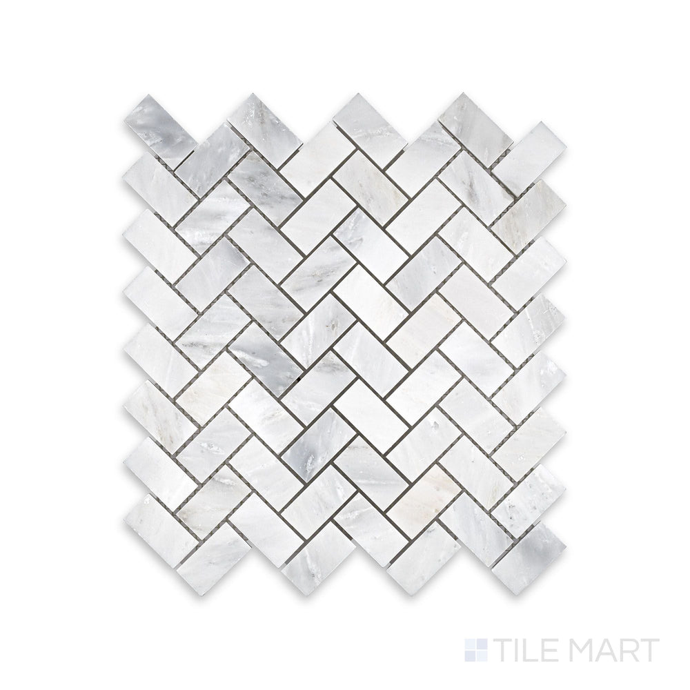 Close-up view of Oriental White Marble 1X2 Herringbone Honed Mosaic, emphasizing its elegant veining and subtle honed texture.