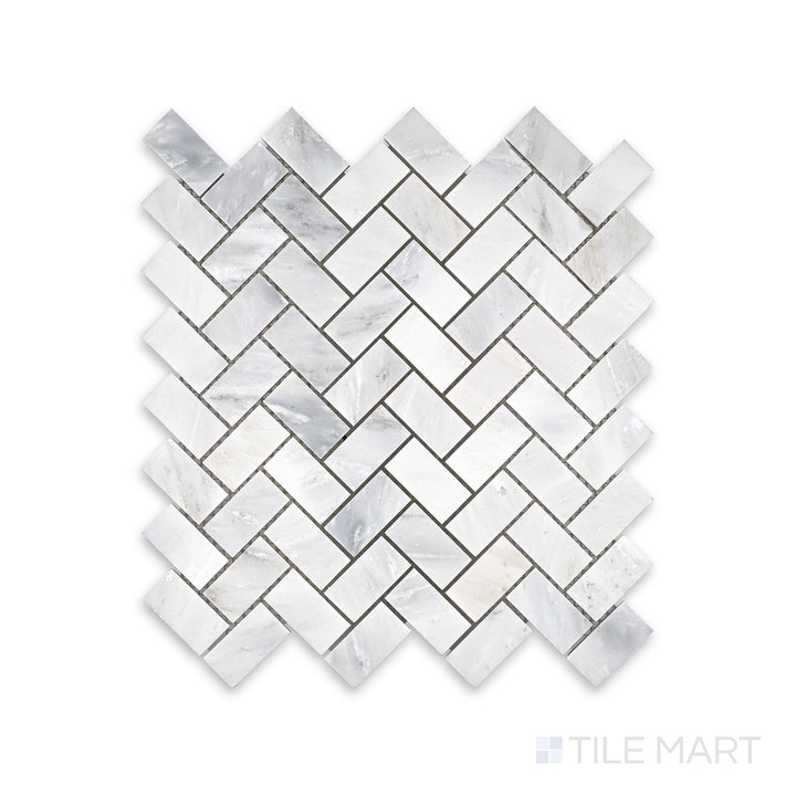 Close-up view of Oriental White Marble 1X2 Herringbone Honed Mosaic, emphasizing its elegant veining and subtle honed texture.