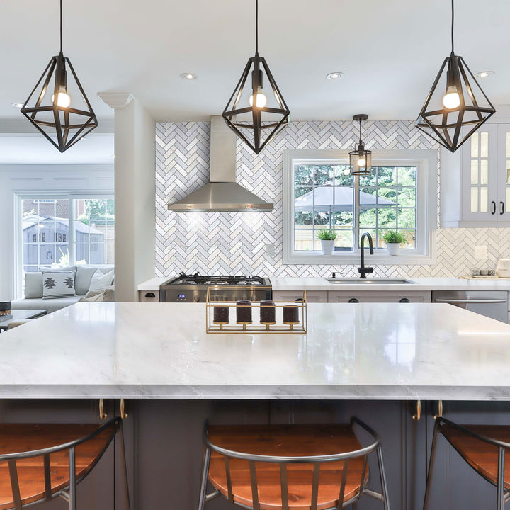 A refined and luxurious bathroom or kitchen scene showcasing Oriental White Marble 1X3 Herringbone Honed Mosaic, adding movement and timeless appeal to the surface.