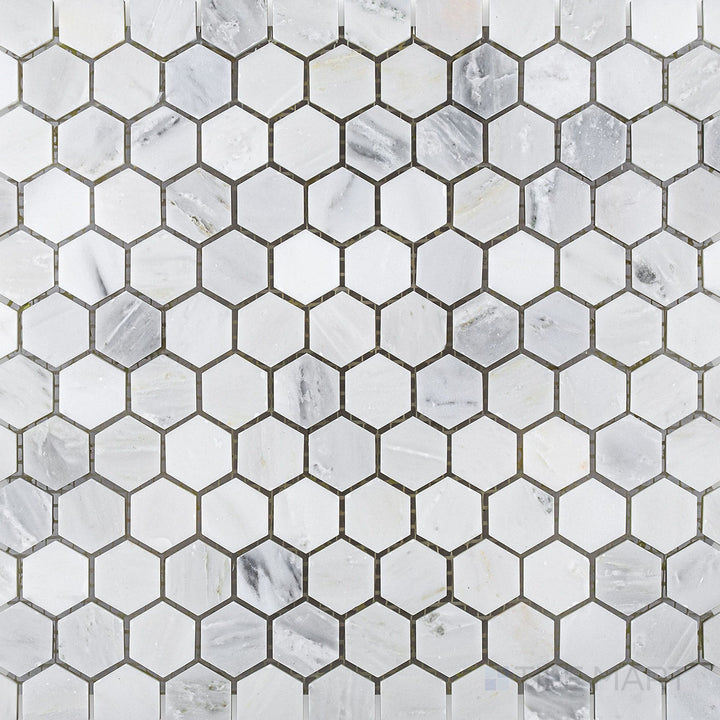 Flat-lay shot of Oriental White Marble 1" hexagon honed mosaic, featuring a geometric hexagonal arrangement with a smooth honed surface.