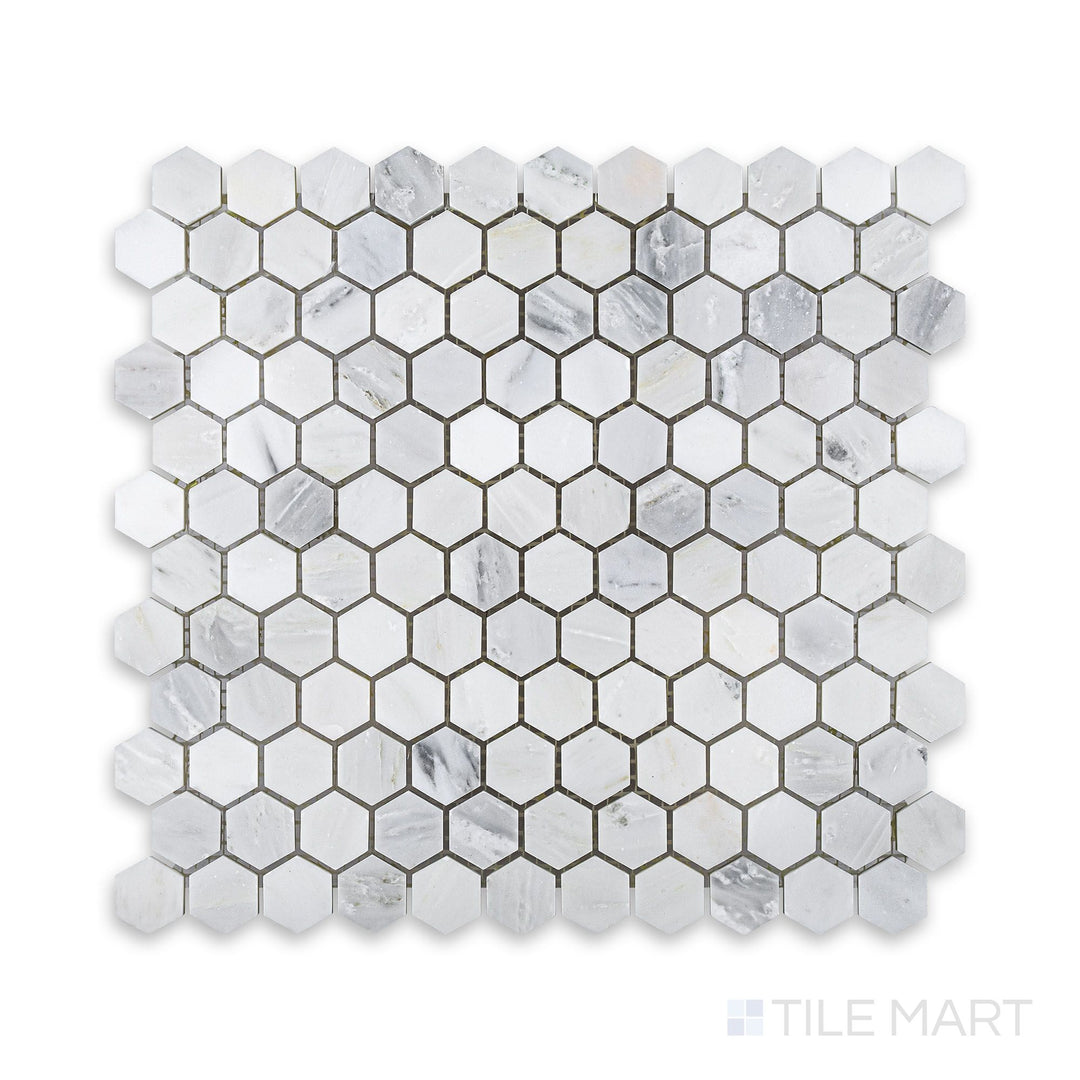A sharp close-up of Oriental White Marble 1" Hexagon Honed Mosaic, capturing the fine details of its matte hexagonal design.