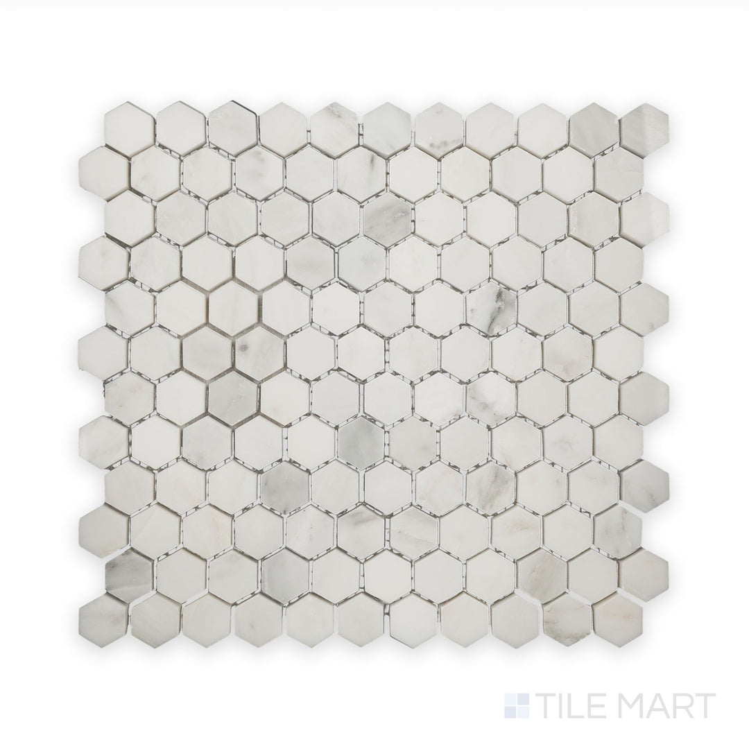 An intricate view of Oriental White Marble 1" Hexagon Polished Mosaic, displaying the natural stone beauty in a geometric arrangement.