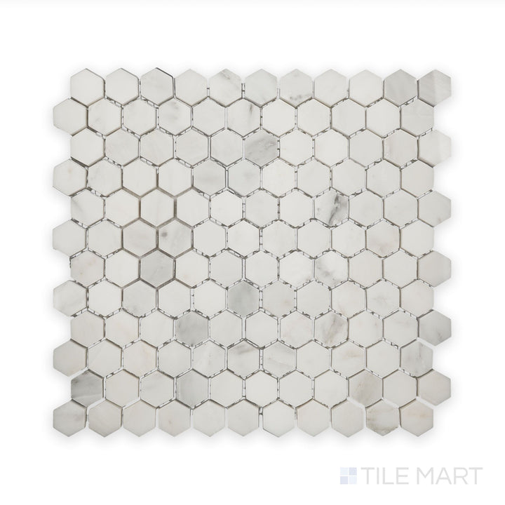 An intricate view of Oriental White Marble 1" Hexagon Polished Mosaic, displaying the natural stone beauty in a geometric arrangement.