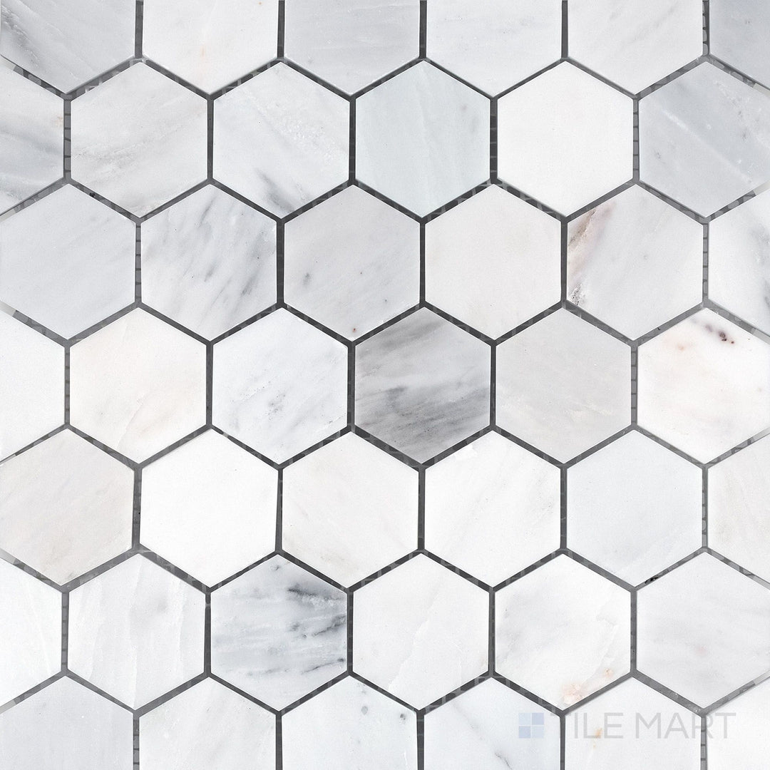 Overhead image of Oriental White Marble 2" hexagon honed mosaic, showcasing a classic hexagonal pattern with a matte honed texture.