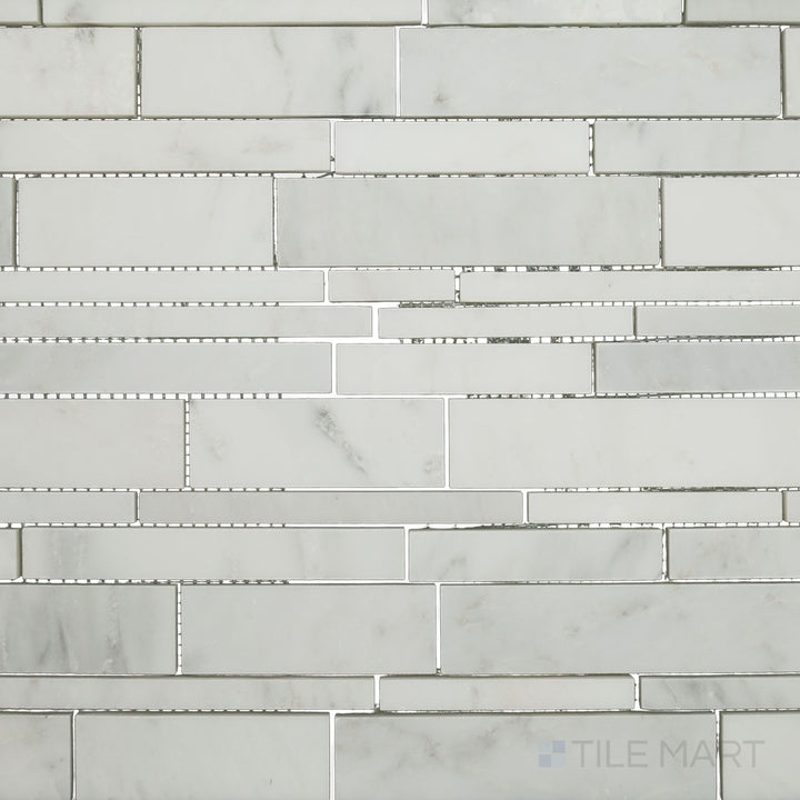 Flat-lay shot of Oriental White Marble linear honed mosaic, showcasing a sleek linear design with a smooth matte finish.