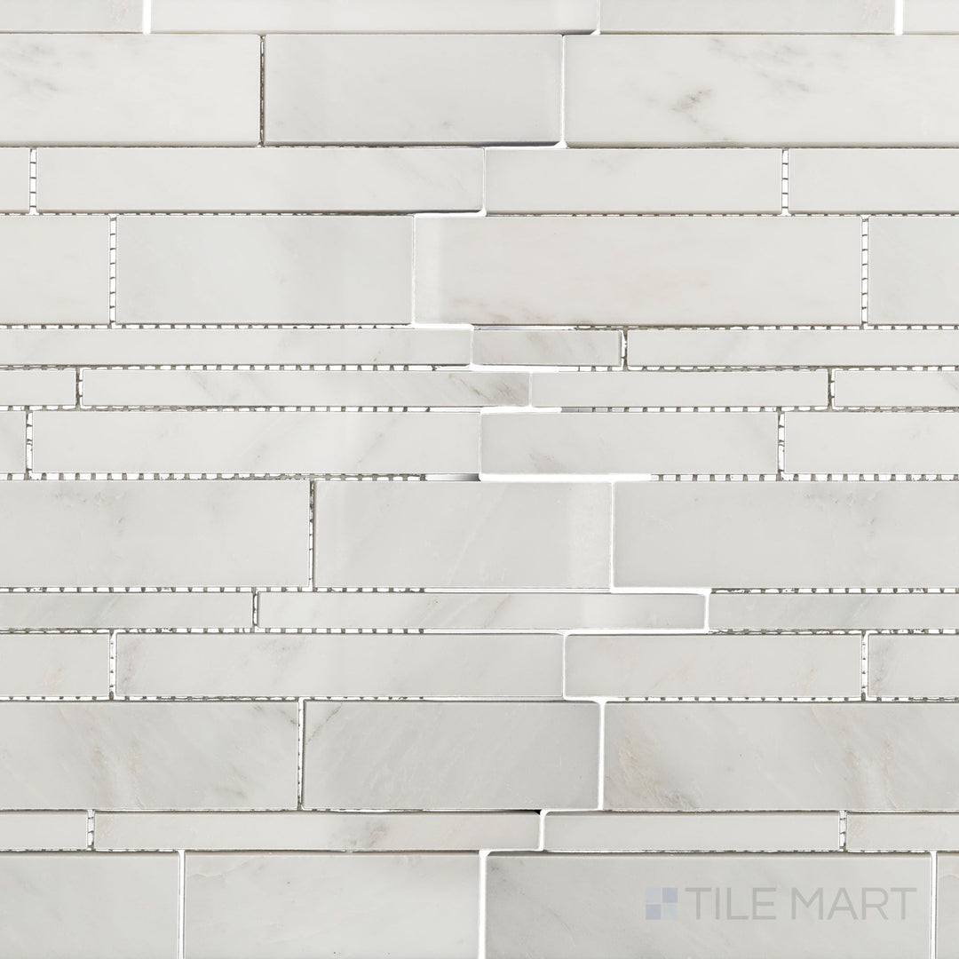 Top-down view of Oriental White Marble linear polished mosaic, featuring an elongated linear pattern with a high-gloss polished surface.