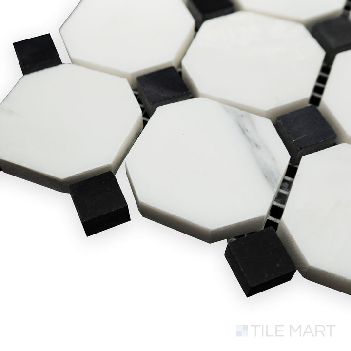 A contrasting blend of white and black is displayed in this corner shot of Oriental White Marble Octagon with Negro Marquina honed mosaic, offering a classic yet bold pattern.