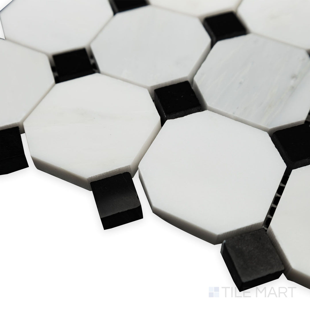 From a bright corner angle, the Oriental White Marble Octagon with Negro Marquina polished mosaic gleams with a luxurious polished finish and striking contrast.