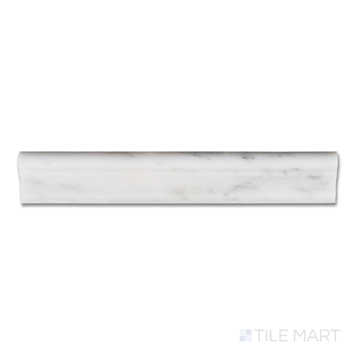 Top-down view of Oriental White Marble 2x12 honed grand chair rail, featuring a soft matte white surface with natural grey veining and a gently rounded profile.
