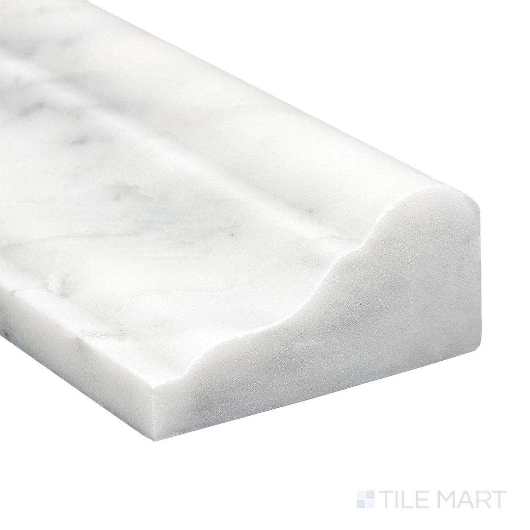 Corner close-up of Oriental White Marble 2x12 honed grand chair rail showing soft white tone and smooth matte edge.