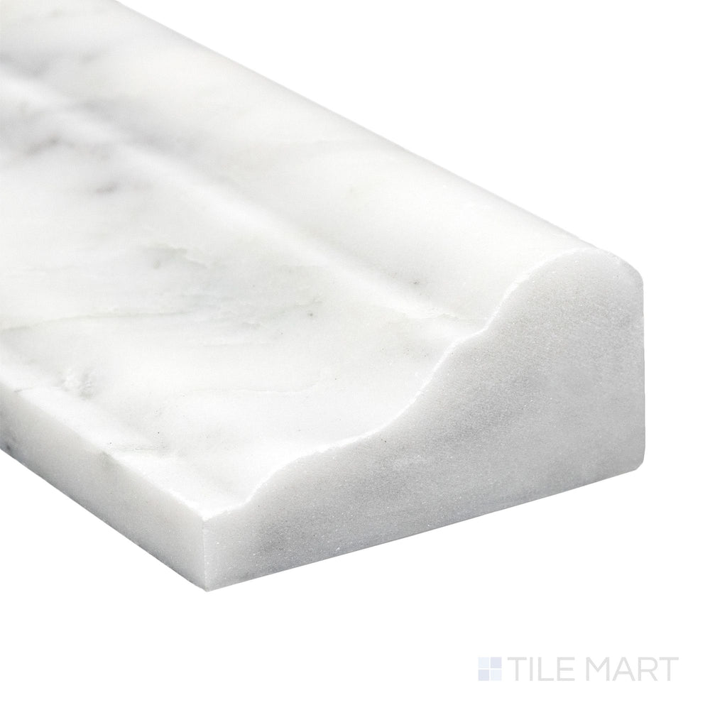 Corner close-up of Oriental White Marble 2x12 honed grand chair rail showing soft white tone and smooth matte edge.