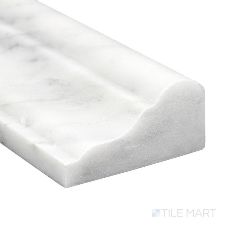 Corner close-up of Oriental White Marble 2x12 honed grand chair rail showing soft white tone and smooth matte edge.
